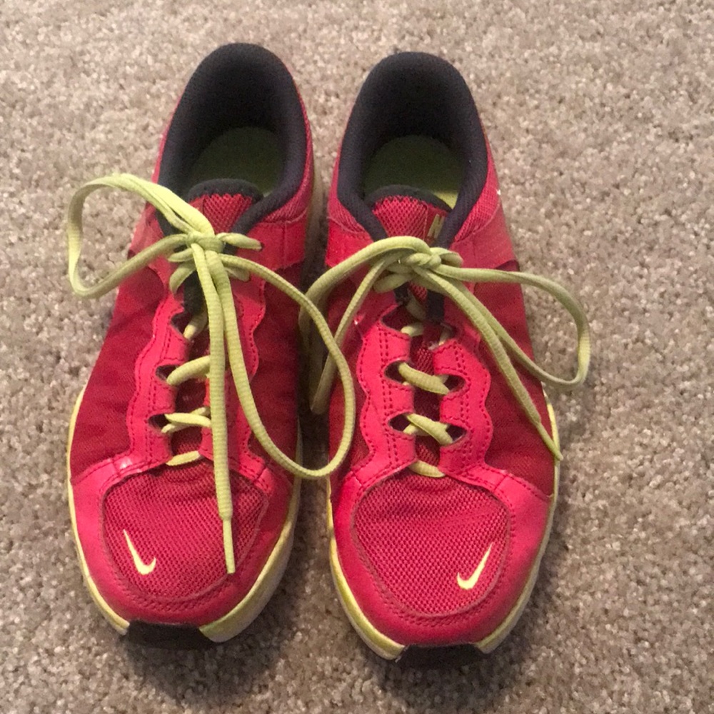 Nike pink and yellow running shoes